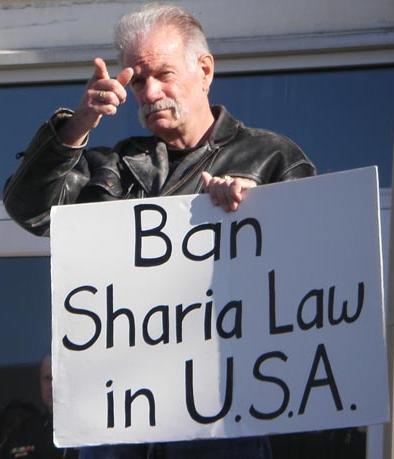 Terry Jones ban sharia placard
