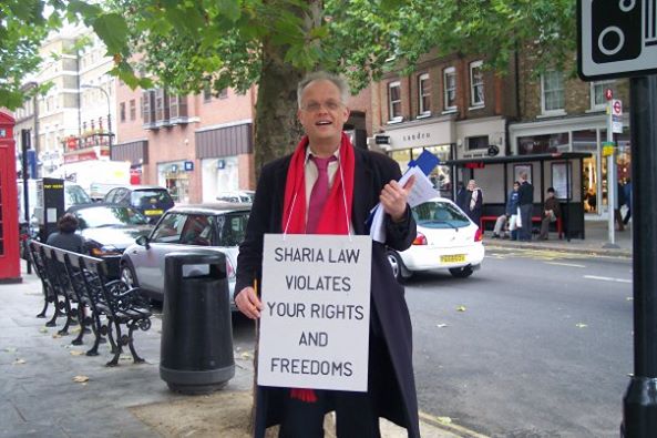 Magnus Nielsen with anti-sharia placard