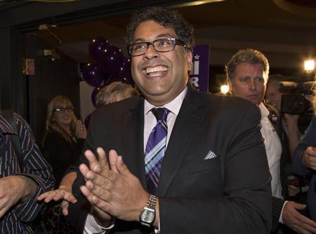 Nenshi reacts after he was elected Calgary mayor for a second term in Calgary